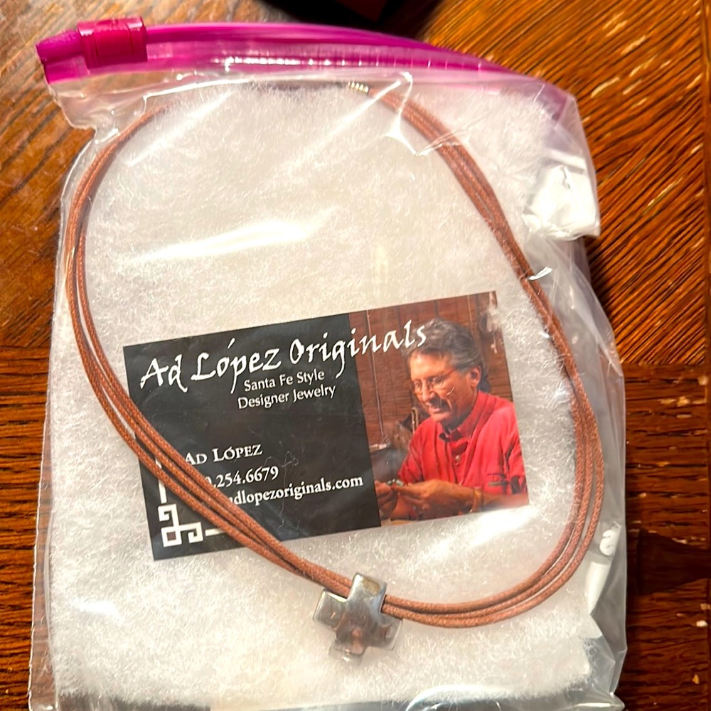 Ad Lopez Originals SantaFe style.Cross leather rope chord New,never worn.